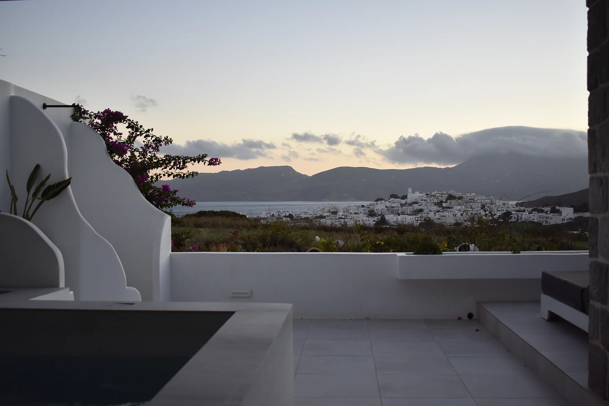 Sunset over Adamas bay from the Calma Suite terrace, Milos