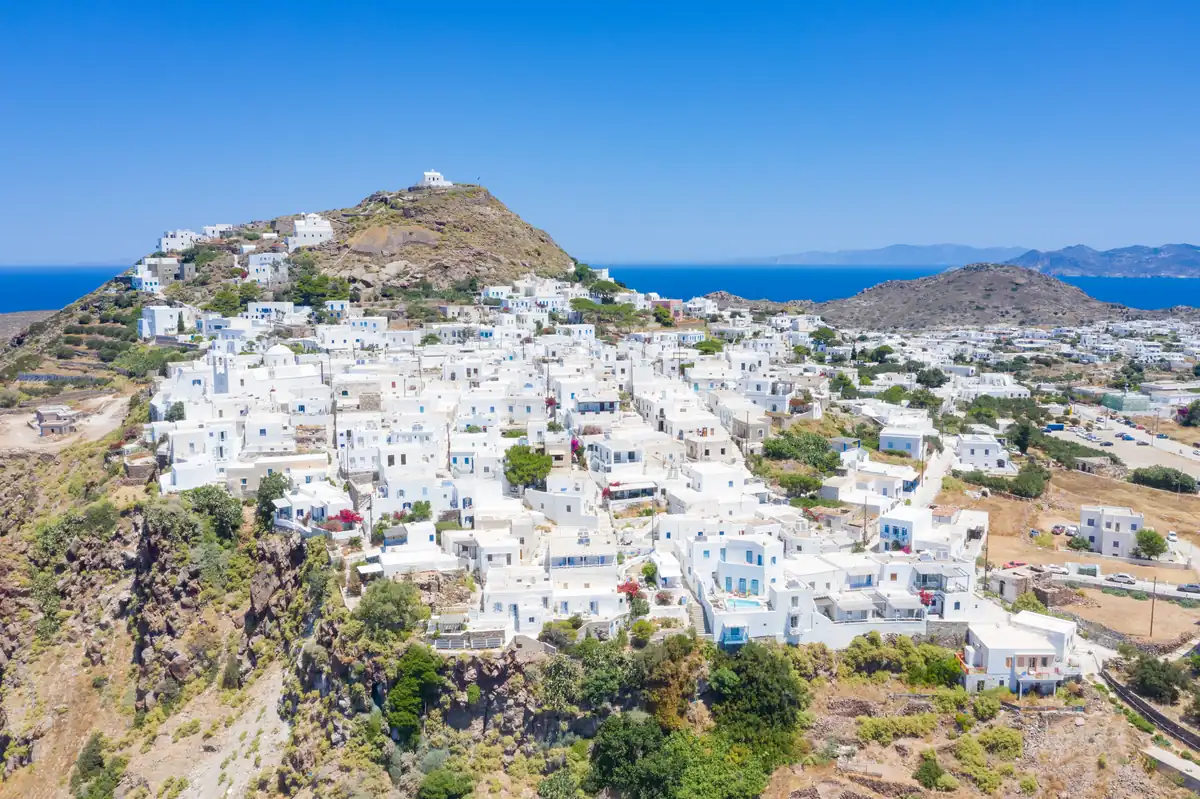 Aerial view of the whitewashed houses of Plaka, Milos