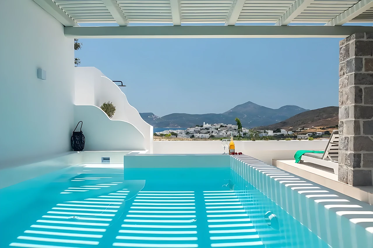 The private pool of Calma Suite overlooking Adamas town, Milos