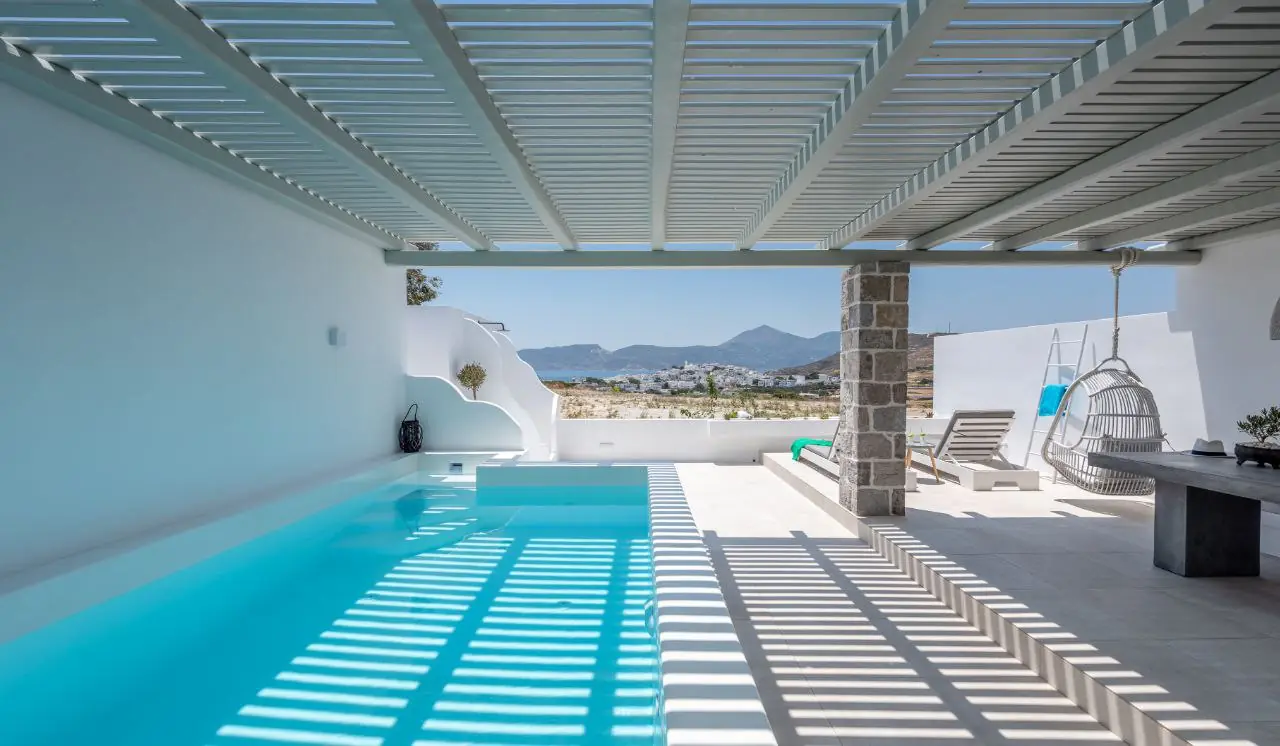 The pool under the pergola looking to the bay